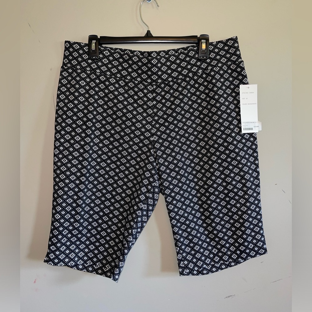 Focus 2000. Brand new shorts size 18. Black and white.